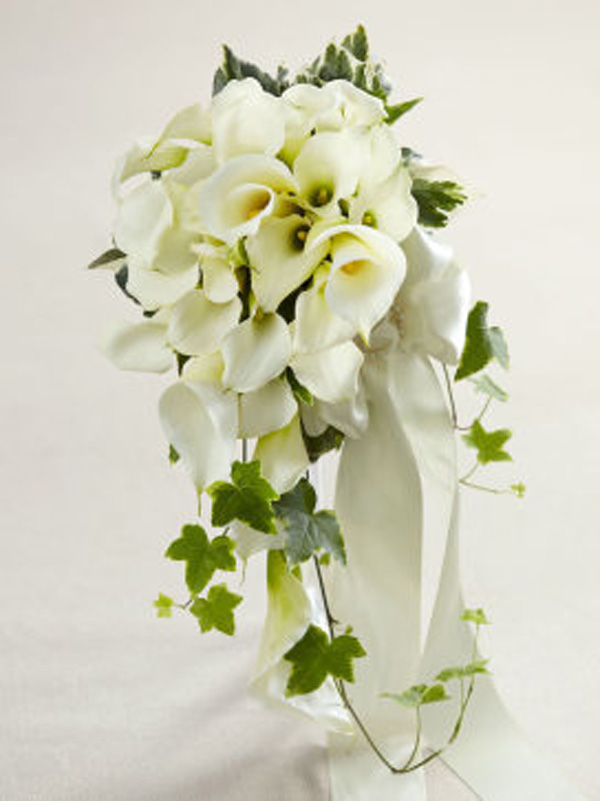 4a. Lillies are an iconic winter flower. This white calla lily cascading bouquet is from Interflora