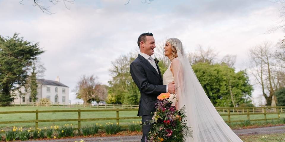 Couple outside house